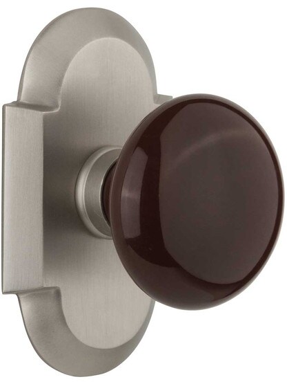 Arched Rosette Door Set with Brown Porcelain Knobs in Satin Nickel.